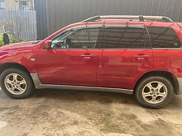 митсубитси аутландер: Mitsubishi Outlander: 2004 г., 2.4 л, Автомат, Газ, Универсал — 5