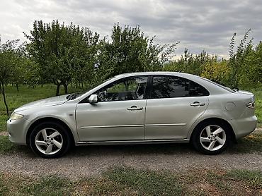 6 дыр: Mazda 6: 2004 г., Кол менен иштөөчү, Бензин, Седан — 10