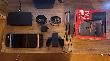 oyun cd: Nintendo Switch 2 İdeal vaziyyatdadir, 2 ay işlanib, har şey daxildir — 1