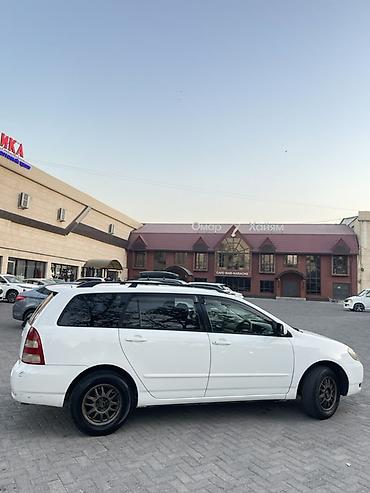 марк таета: Toyota Corolla: 2002 г., Бензин, Универсал — 4
