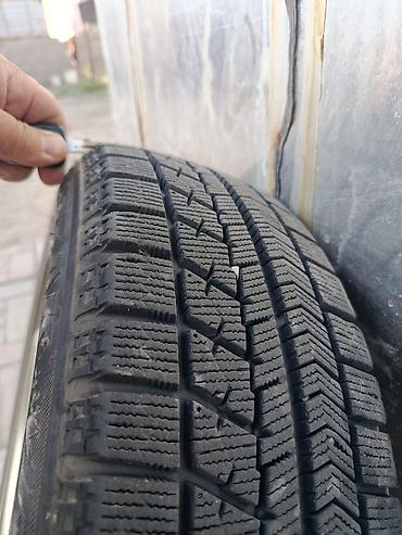 жели: Пара зимних колес в сборе на штампованных дисках. - Шины: Bridgestone — 3