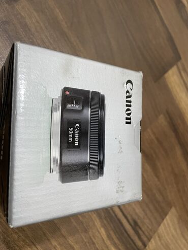 активный буфер: Объектив Canon EF 50mm f/1.8 STM в компактном черном корпусе