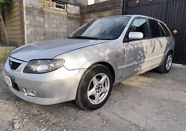 Mazda: Mazda Familia: 2004 г., 2 л, Кол менен иштөөчү, Газ, Хетчбек — 2