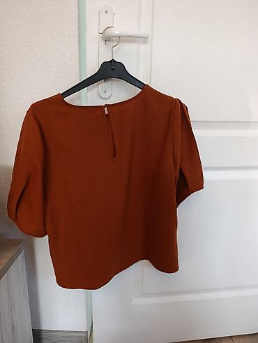 vero moda bluze: Ženska bluza u terakota/narandžastoj boji. Kratak, ravan kroj dužine — 1