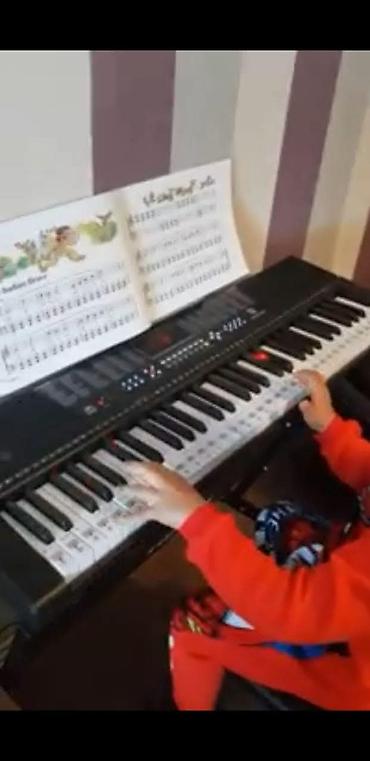 dr kong: Sintezator. Təzə. Qutuda 5 oktava 61 klaviş Pianino səslidir. Əlavə — 3