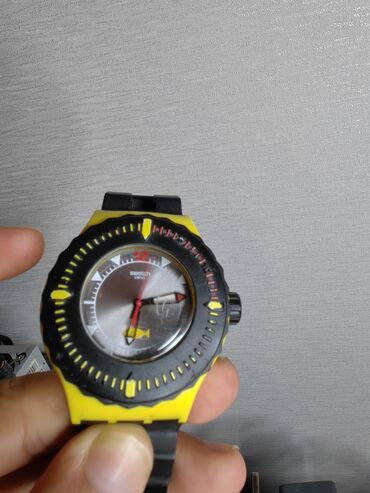 Eynəklər: Qol saatı, Swatch