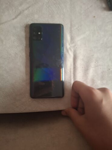 Samsung Galaxy A51, 64 ГБ, цвет - Черный, Отпечаток пальца, Кнопочный, Face ID