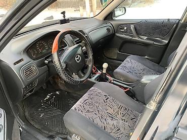 Mazda: Mazda 323: 2000 г., 1.8 л, Механика, Бензин, Универсал — 6