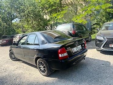 mazda mx5: Mazda 323: 2002 г., 1.5 л, Автомат, Бензин, Седан — 2