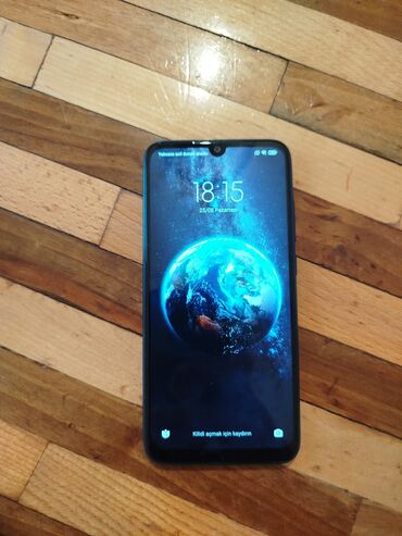 gence telfon: Xiaomi Redmi Not 7 smartfonu, arxa tərəfində iki kamera və barmaq izi