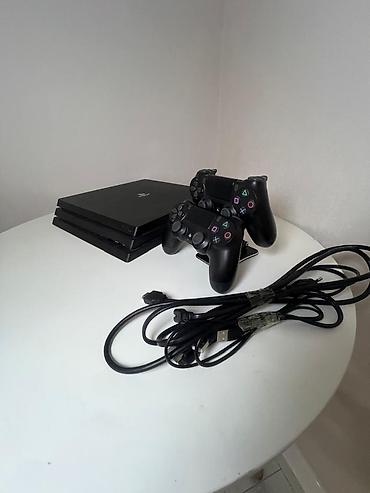 PS4 (Sony PlayStation 4): PlayStation 4 Pro (черный) Комплектация: - игровая консоль PS4 Pro — 9