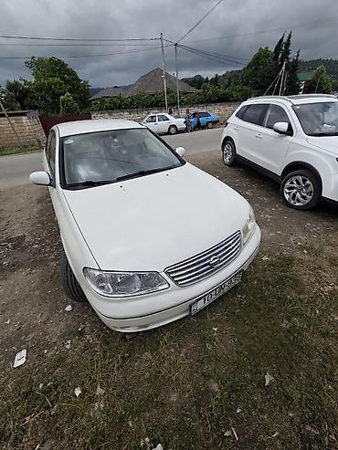 hyundai i30 oluxanası: Nissan Sunny: 1.6 l | 2007 il Sedan — 1