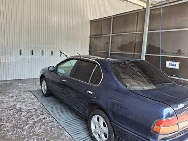 авто в рассрочку без процентов: Седан Nissan Cefiro в темно-синем цвете. Автомат 2об газ+бензин нужно