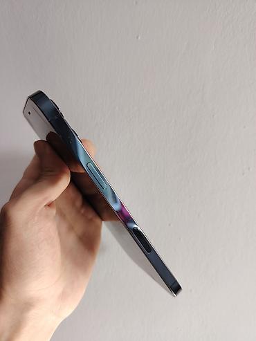 iphone 11 elde: IPhone 12 Pro Max, 128 GB, Pacific Blue, Simsiz şarj, Face ID — 10