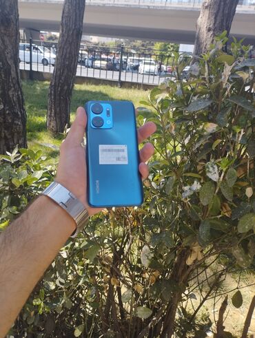 200 manatlıq telefonlar: Honor X7a, 128 ГБ, цвет - Синий, Кнопочный, Отпечаток пальца, Face ID