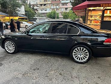 bmw 525i: BMW 7 Series (E65) sedan – qara rəng, Azərbaycan nömrə nişanı — 7