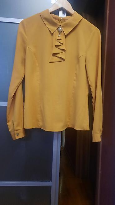 crivit torba: Ženska elegantna bluza u boji senfa. - Model sa dugim rukavima i — 1