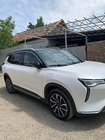 Другие автомобили: Электромобиль в синем цвете, модель 2024 года, обладает современным — 20