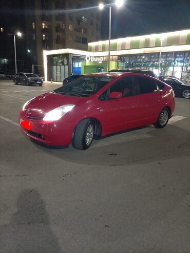 Toyota: Toyota Prius hibrid, qırmızı rəng, liftback kuzov. Texniki və — 10