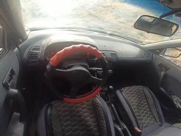машина ала бука: Mazda 323: 1990 г., 1.6 л, Механика, Бензин, Седан