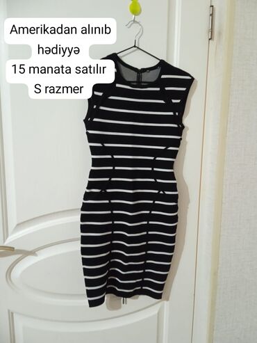 женская блуза в горошек: Qara və ağ zolaqlı, bədənə oturan qadın donu. Bu don S ölçüdədir və