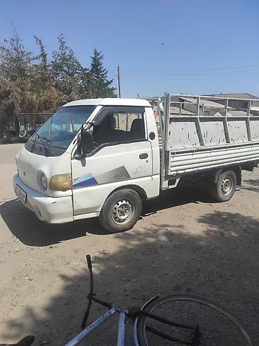 каракол мото: Грузовой малотоннажный бортовой автомобиль (кабина над мотором), белый — 2