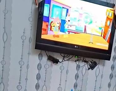 wifi adapteri: LG divar tipli televizor + Yupiter TV qutusu (IP/OTT set-top box) — 4