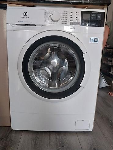 duymə masini: Electrolux PerfectCare 600 önyükləməli paltaryuyan - Yük həcmi: 8 kq — 1