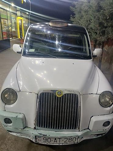Rover: LTI TX4 London Taxi – klassik taksi dizaynlı, geniş və rahat salonlu — 1