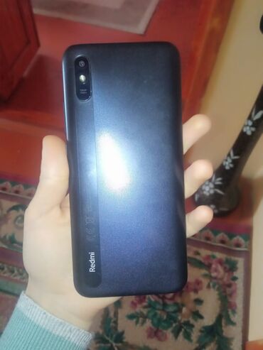 Xiaomi: Xiaomi Redmi 4A, 32 ГБ, цвет - Черный, 
 Две SIM карты