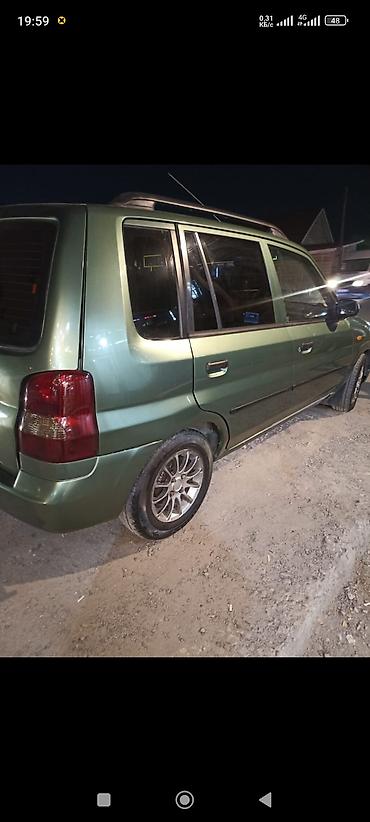 cx 9: Mazda Demio: 2000 г., 1.5 л, Автомат, Бензин, Минивэн — 9