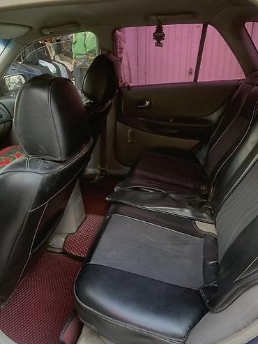авто пульт: Mazda 323: 2002 г., 1.6 л, Механика, Бензин, Хэтчбэк — 5