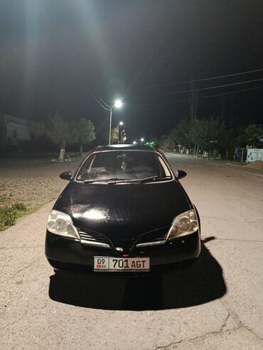 решетка на виндом: Черный седан Nissan Primera. Автомобиль отличается элегантным дизайном