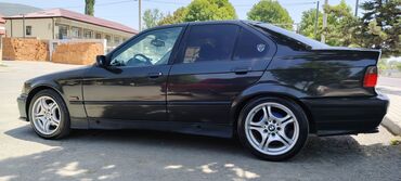 Polo köynəklər: BMW 3 series: 1.6 l | 1996 il Sedan