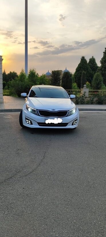 Kia Optima: 2 л | 2015 г