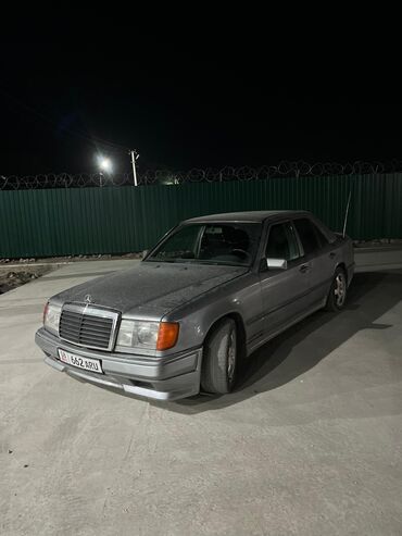 мерседес 124 жалал абад: Седан Mercedes-Benz серого цвета, оснащенный литыми дисками. Модель