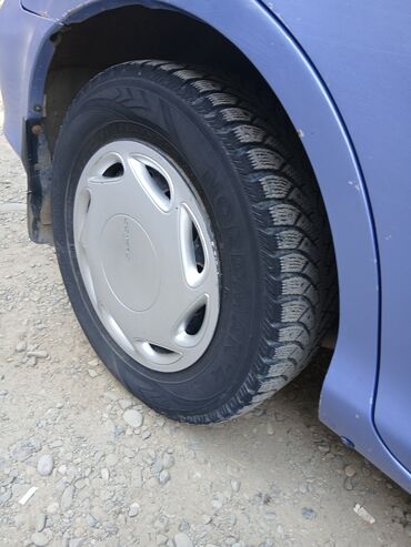 Другие автомобили: Синий компактный хэтчбек (3/5 дверей) с зимней резиной Nokian Nordman at lalafo.kg — 3 Другие автомобили: Синий компактный хэтчбек (3/5 дверей) с зимней резиной Nokian Nordman — 3