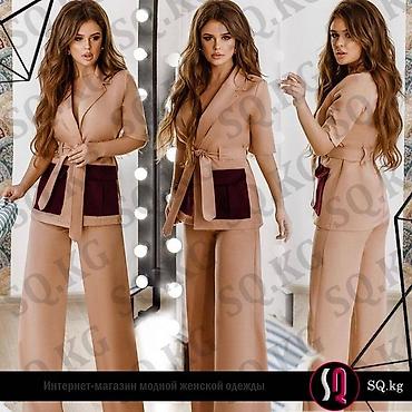 Другая женская одежда: Классические костюмы. Брючные костюмы. Юбочные костюмы. Все это можно — 19