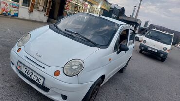 диск gx: Daewoo Matiz, 5‑дверный городской хэтчбек, белый цвет. Основные