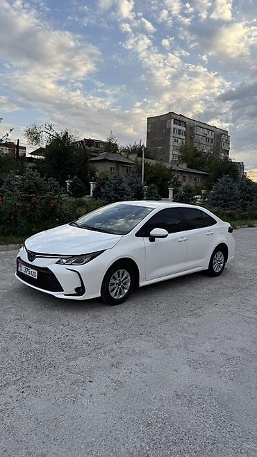 Toyota Corolla: 2022 г., 1.8 л, Автомат, Гибрид, Седан