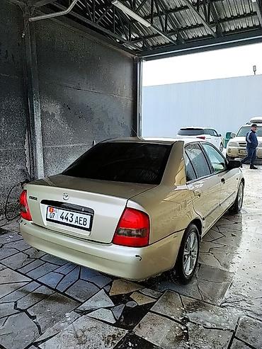 Mazda: Mazda 323: 2000 г., 1.5 л, Механика, Бензин, Седан — 11