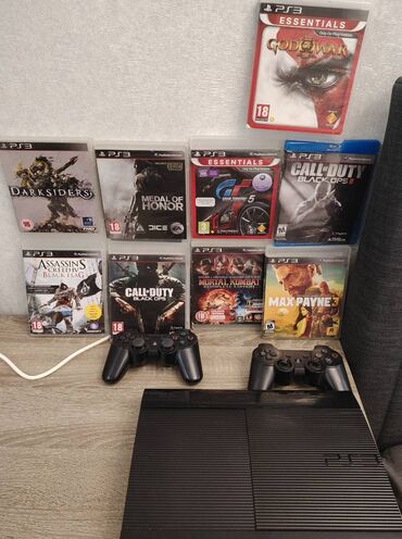 oyun konsolu rul: PlayStation 3 konsolu, 2 pult və 9 oyun