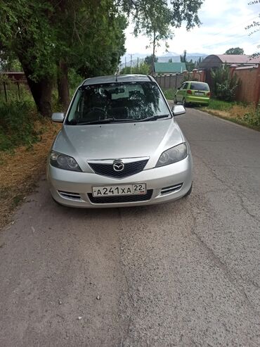 электронные автомобили: Mazda Demio: 2003 г., 1.5 л, Типтроник, Газ, Хэтчбэк