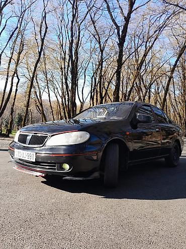 chevrolet aveo oluxana: Nissan Sunny sedan – qara rəng, 4 qapı, ön-çəkiş. Xüsusiyyətlər: - — 5