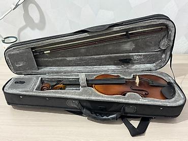 Скрипки: Скрипка 1/4 в комплекте с футляром и смычком,в комплекте мостик и — 1