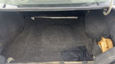 Daewoo: Daewoo Nexia sedanı - Kuzov: 4 qapılı sedan, açıq gümüş rəng - Nömrə — 11