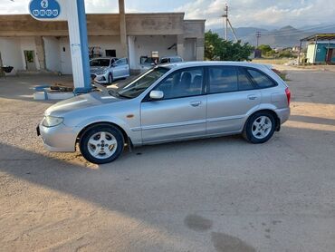 авто в рассрочку минивэн: Mazda 323: 2001 г., 1.6 л, Механика, Бензин, Хетчбек