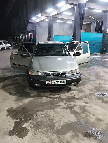 арзан машине: Daewoo Nexia: 2004 г., Кол менен иштөөчү, Бензин, Седан — 3