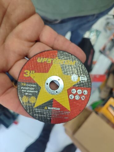 Santexnika: URETOSON markalı 75 mm diametrli abraziv kəsmə diski. Bu disk, ümumi