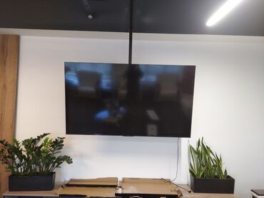 Установка телевизоров: Кронштейн для телевизора поворотно-наклонный с регулировкой высоты — 2